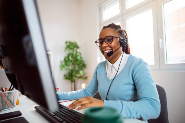 Customer support specialist working at her office. Customer support specialist working at her office.